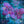 An expressive mixed-media painting of purple orchids against a textured teal and blue background with gold linework accents and the words 'fall in love' in the lower right.