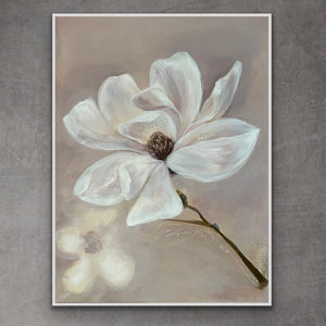 Floral fine art canvas print with a white flower styled in a calm, neutral interior