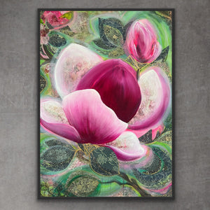 Framed magnolia of pink flowers on a textured gray wall