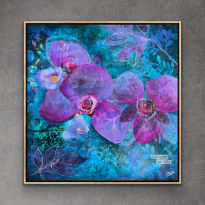 A framed square painting featuring large purple orchid flowers over a textured turquoise and blue background, displayed against a gray wall.