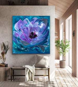 Abstract painting of a flower in a modern living room
