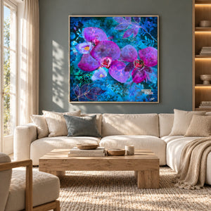 Large abstract purple and blue floral wall art  in the living room. Print on canvas in a natural floating frame. 