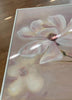 Detail of a floral fine art canvas print with soft neutral tones and delicate texture